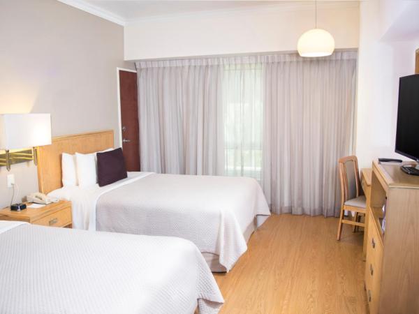 iStay Hotel Monterrey Histórico : photo 1 de la chambre chambre deluxe avec 2 lits doubles