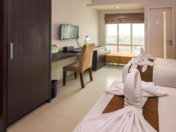 The Square Surabaya Hotel : photo 3 de la chambre chambre lits jumeaux deluxe