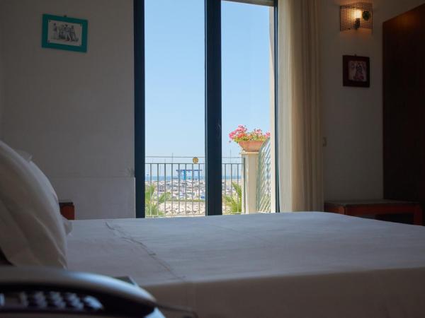 Saint Joseph : photo 8 de la chambre chambre double ou lits jumeaux de luxe - vue latérale sur mer