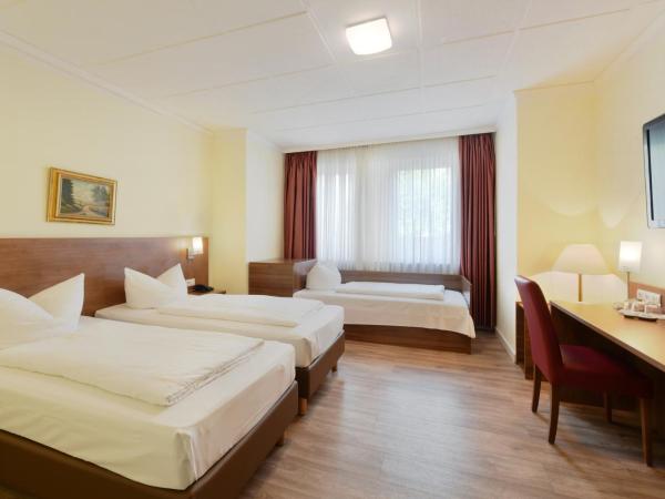 Hotel Schumacher Düsseldorf : photo 1 de la chambre chambre triple