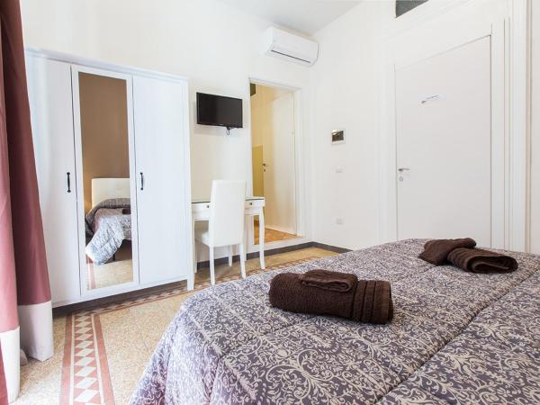 Suite Cagliaritane Notti in centro : photo 6 de la chambre chambre double ou lits jumeaux deluxe - vue sur ville 