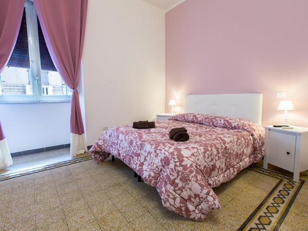 Suite Cagliaritane Notti in centro : photo 6 de la chambre chambre triple deluxe