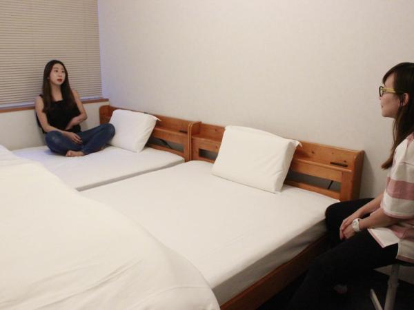 Mezame Hostel : photo 4 de la chambre chambre lits jumeaux