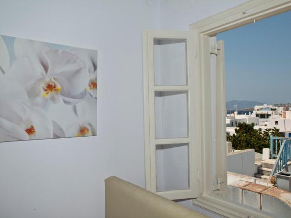 Karboni Hotel : photo 1 de la chambre chambre triple