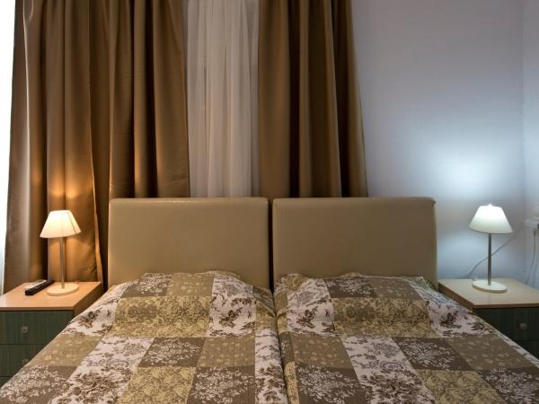 Karboni Hotel : photo 3 de la chambre chambre triple