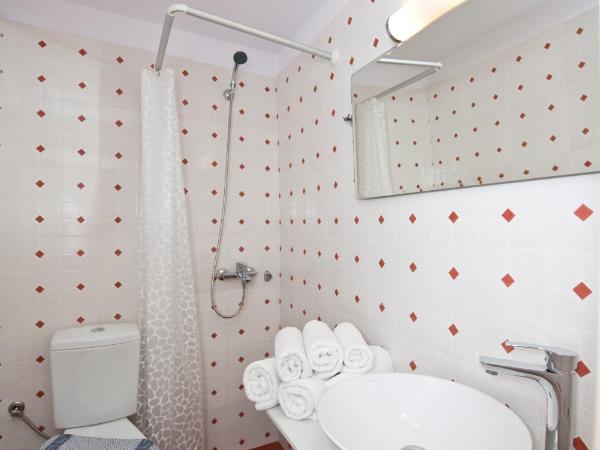 Karboni Hotel : photo 5 de la chambre chambre triple