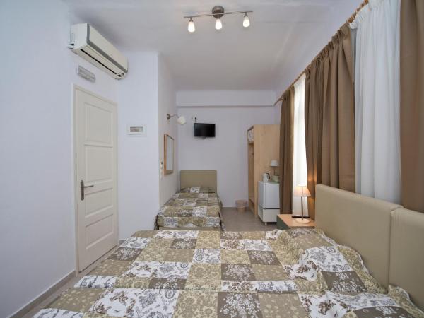 Karboni Hotel : photo 7 de la chambre chambre triple