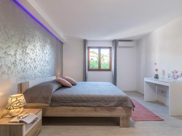 Apartments Villa Tre Marie : photo 9 de la chambre appartement avec balcon