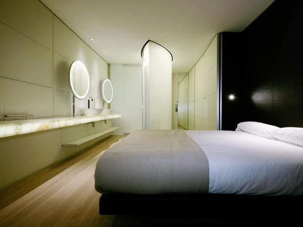Hotel Puerta America : photo 2 de la chambre chambre deluxe