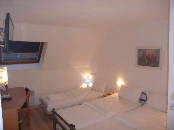 Hotel Primo Colmar Centre : photo 2 de la chambre chambre triple avec 3 lits simples