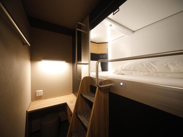 Dormy Inn Korakuen : photo 2 de la chambre lit simple dans dortoir pour hommes - enregistrement après 17h00, départ avant 10h00