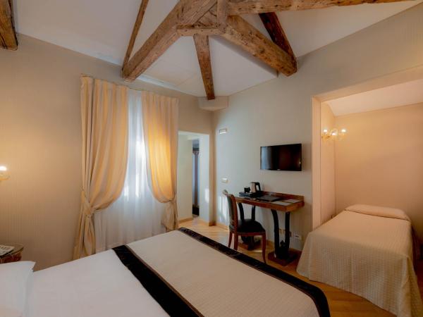 Hotel Paganelli : photo 6 de la chambre chambre triple