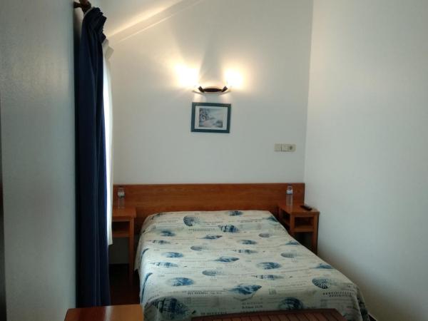 Rimavier Residence : photo 4 de la chambre chambre double avec salle de bains privative