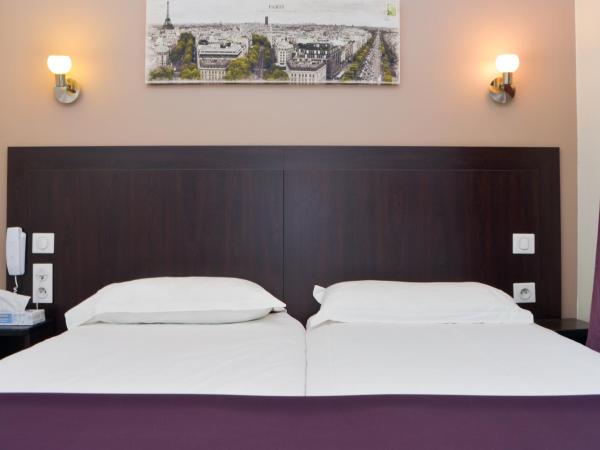 Hôtel du Quai de Seine : photo 4 de la chambre chambre lits jumeaux