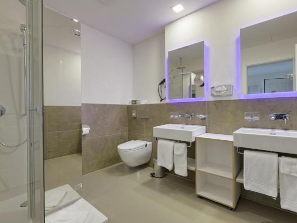 Boutique Hotel Bellevue : photo 4 de la chambre hébergement familial boutique - vue sur jardin 