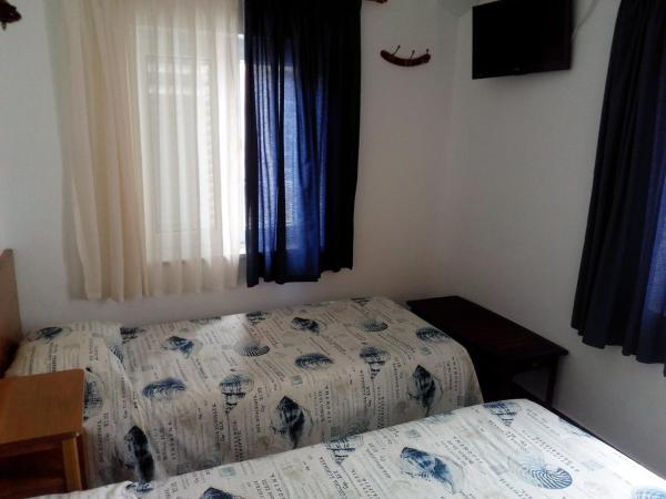 Rimavier Residence : photo 4 de la chambre chambre lits jumeaux avec salle de bains privative