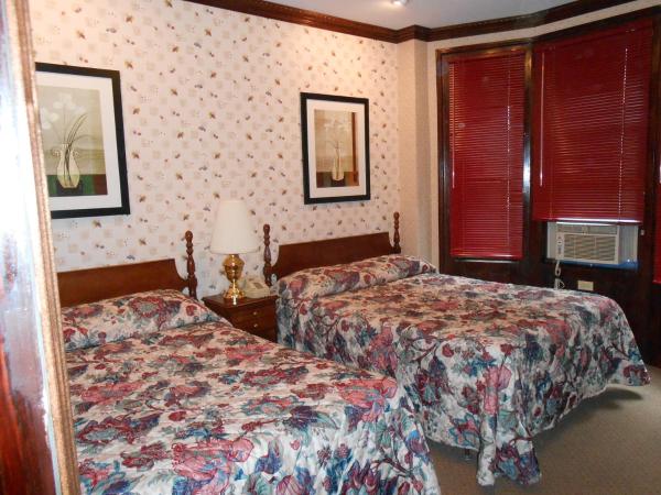 Hotel 31 Extended Stay : photo 10 de la chambre chambre double avec 2 lits doubles et salle de bains privative