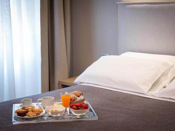 HNN Luxury Suites : photo 10 de la chambre chambre deluxe