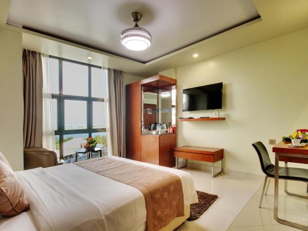 Unima Grand : photo 2 de la chambre chambre deluxe - navette aéroport aller-retour gratuite et réduction de 10 % sur nourriture, boissons et spa - vue sur océan