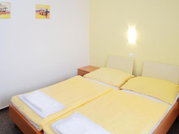 Hotel Imos : photo 7 de la chambre chambre lits jumeaux