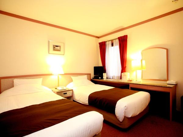 Arrow Hotel in ShinsaiBashi 朝食無料サービス中 : photo 8 de la chambre chambre lits jumeaux standard