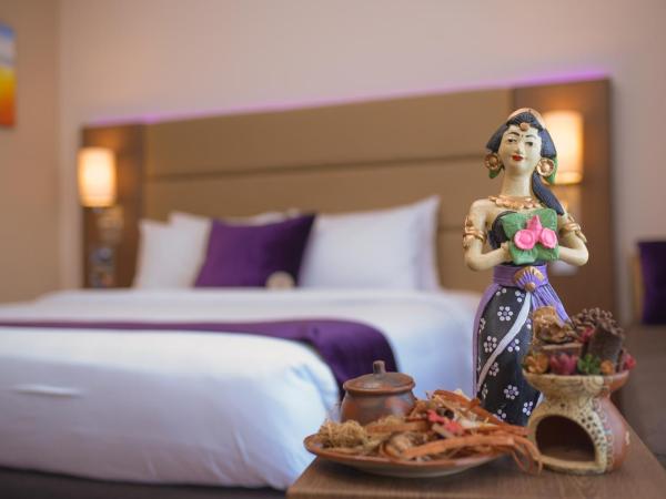 Satoria Hotel Yogyakarta - CHSE Certified : photo 8 de la chambre chambre deluxe