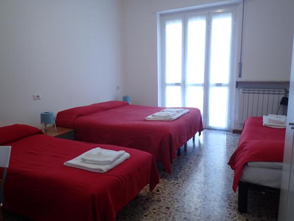 Hotel Brivio : photo 1 de la chambre chambre quadruple Économique