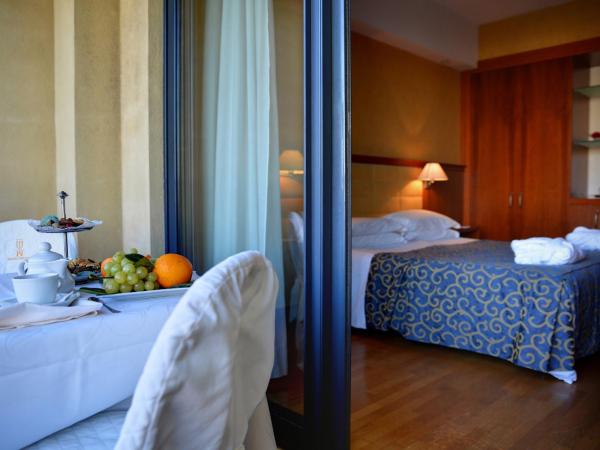 Hotel Nettuno : photo 2 de la chambre chambre double ou lits jumeaux supérieure - vue sur mer