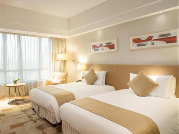 Cinese Hotel Dongguan Shijie : photo 2 de la chambre chambre lits jumeaux deluxe