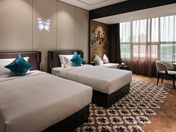 Paco Hotel Chebeinan Metro Guanghzou-Free Shuttle Bus For Canton Fair : photo 2 de la chambre chambre lits jumeaux deluxe