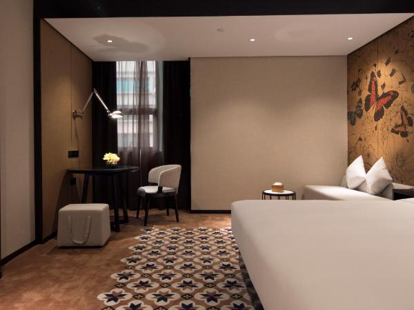 Paco Hotel Chebeinan Metro Guanghzou-Free Shuttle Bus For Canton Fair : photo 2 de la chambre chambre lit king-size deluxe