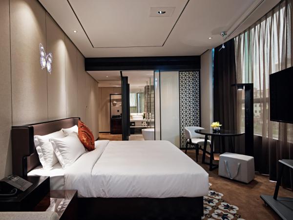 Paco Hotel Chebeinan Metro Guanghzou-Free Shuttle Bus For Canton Fair : photo 2 de la chambre chambre lit king-size premium