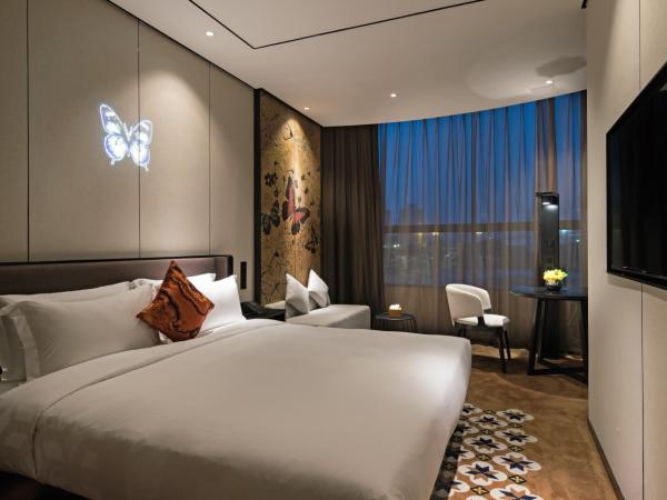 Paco Hotel Chebeinan Metro Guanghzou-Free Shuttle Bus For Canton Fair : photo 1 de la chambre chambre lit king-size premium