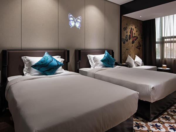 Paco Hotel Chebeinan Metro Guanghzou-Free Shuttle Bus For Canton Fair : photo 8 de la chambre chambre lits jumeaux deluxe