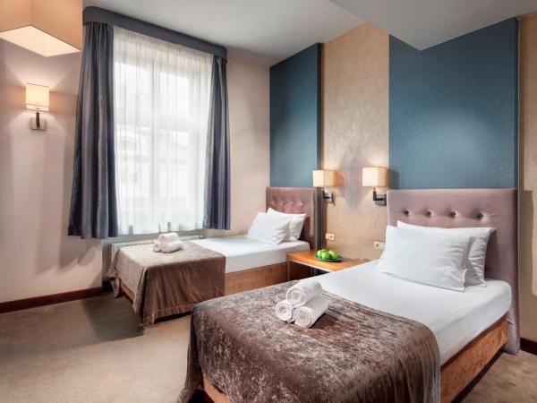 Hotel Unicus Krakow Old Town - Destigo Hotels : photo 1 de la chambre chambre lits jumeaux