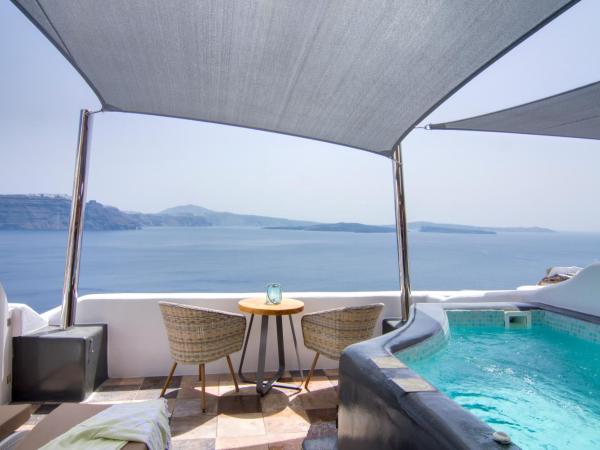 Secret Legend Suites : photo 1 de la chambre grande suite avec bains à remous extérieur - vue sur caldeira