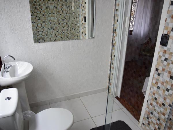 Hotel Alvorada do Sol : photo 1 de la chambre chambre triple