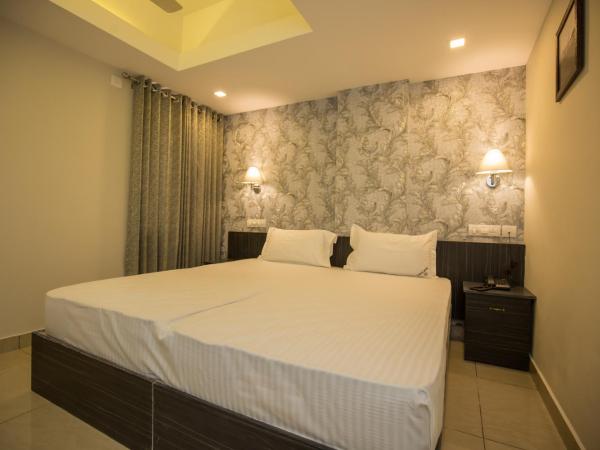 South Gate Residency : photo 3 de la chambre chambre double standard avec ventilateur