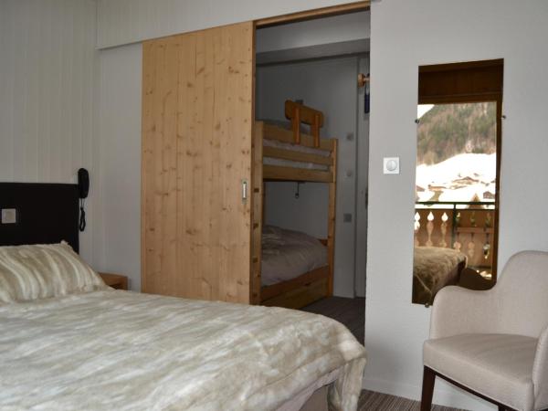 L'Hermine Blanche : photo 6 de la chambre chambre quadruple supérieure (2 adultes + 2 enfants)