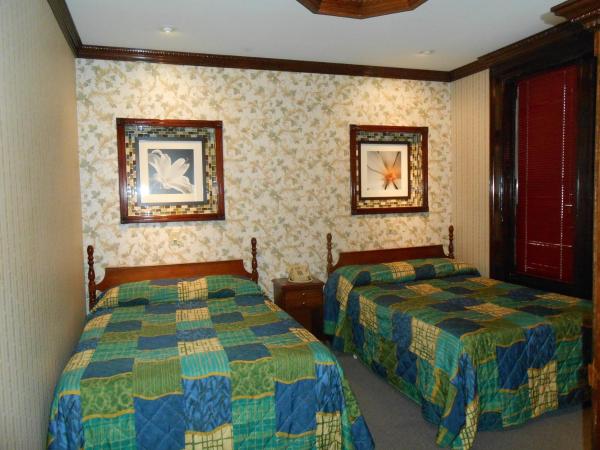 Hotel 31 Extended Stay : photo 6 de la chambre chambre lits jumeaux avec salle de bains commune