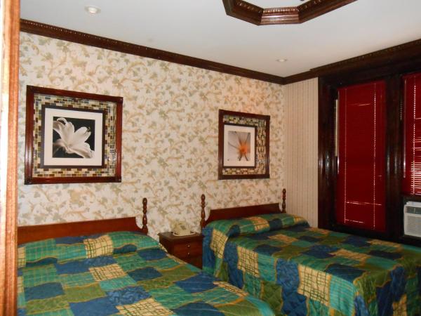 Hotel 31 Extended Stay : photo 5 de la chambre chambre lits jumeaux avec salle de bains commune