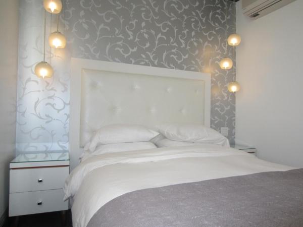 La Pensione Hotel : photo 1 de la chambre chambre lit queen-size deluxe - vue sur ville