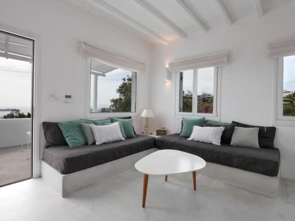 Ostraco Suites : photo 7 de la chambre suite avec bain à remous extérieur - vue sur mer 