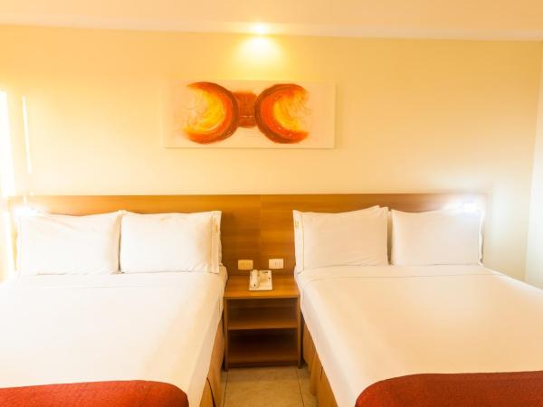 Praiamar Express Hotel : photo 8 de la chambre chambre supérieure avec 2 lits doubles - vue sur mer