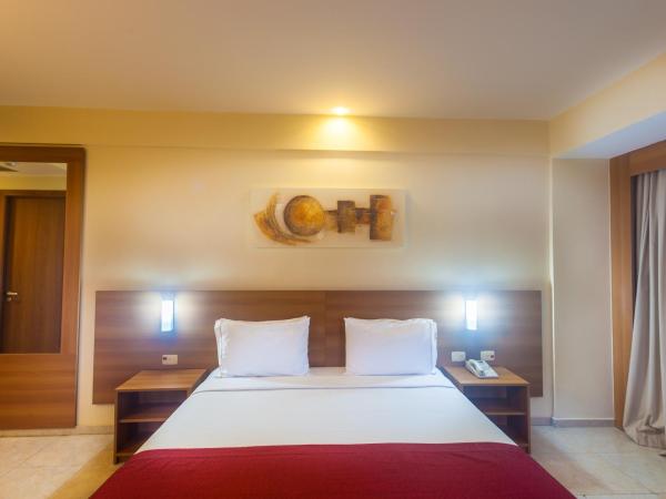 Praiamar Express Hotel : photo 7 de la chambre chambre de luxe - vue sur mer et balcon