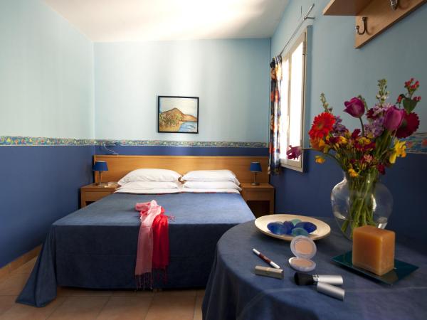 Villaggio Albergo Internazionale La Plaja : photo 1 de la chambre bungalow (2 adultes)
