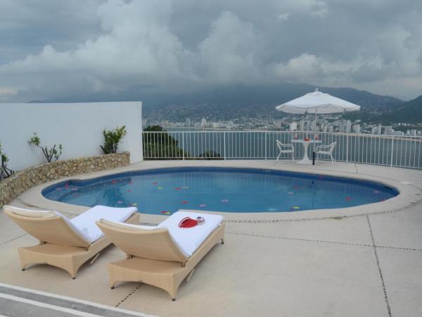 Las Brisas Acapulco : photo 9 de la chambre petite maison avec piscine privée et 2 lits