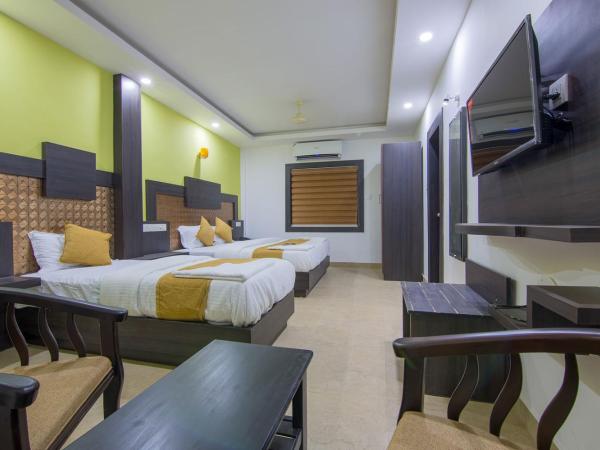 Hotel Kochi Crown : photo 4 de la chambre chambre triple deluxe