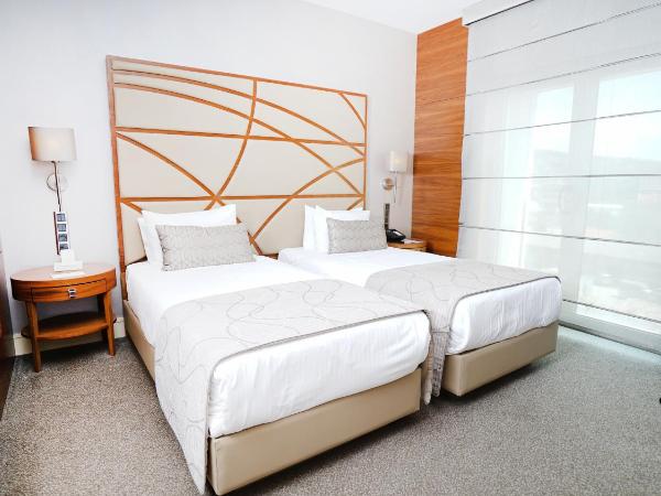 Cevahir Hotel Istanbul Asia : photo 2 de la chambre chambre lits jumeaux supérieure communicante - vue sur terres