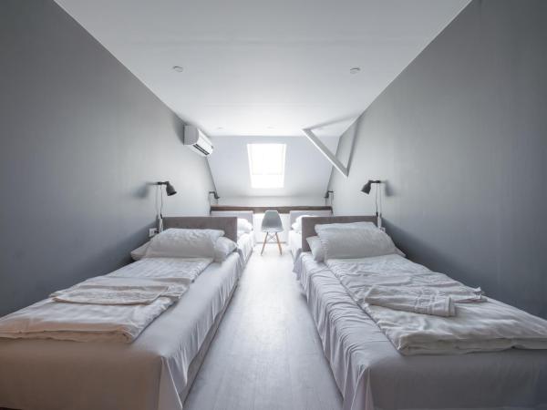 Chesscom Guesthouse : photo 1 de la chambre chambre quadruple Économique